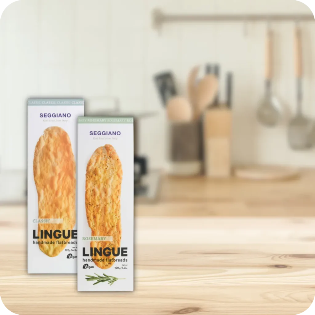 Product image showing all currently available Seggiano Flatbread products with a kitchen in the background.